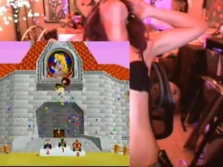 Geek girl cums playing Mario Kart