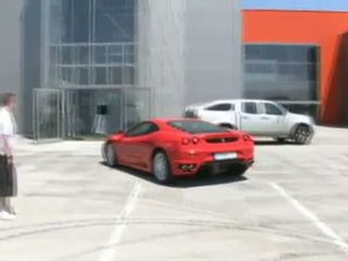 Hottie Jerks Off Next to Ferrari