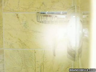 Filthy hottie Brandi Belle intrudes her boyfriend in the shower for a blowjob