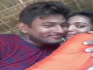 Cuple kissing in village