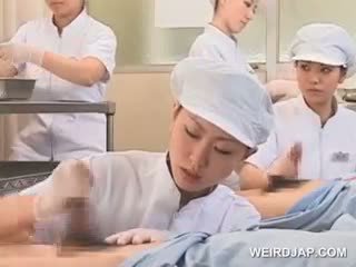 Teen Asian Nurses Rubbing Shafts For S...